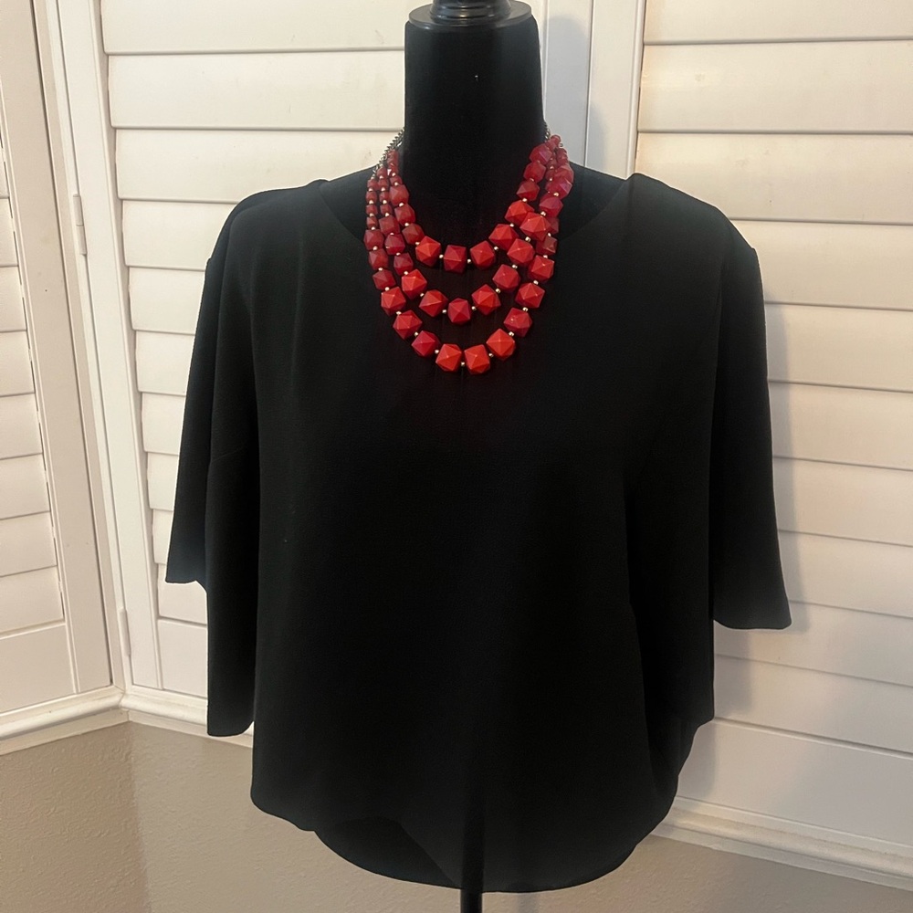 Black Torrid crop top with bows in the back. #plussize #torrid.